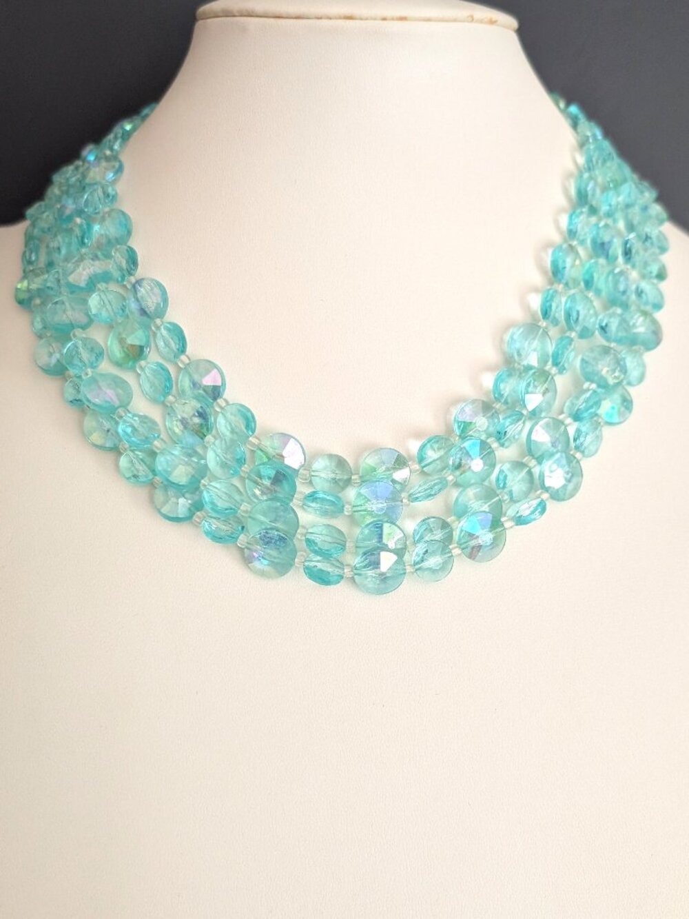 4 strand blue with iridescence beaded necklace